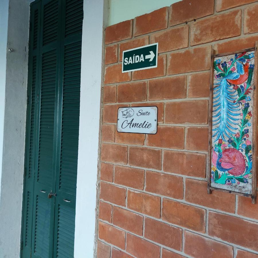 Pousada Chateau Sophie Itanhaém Quarto foto